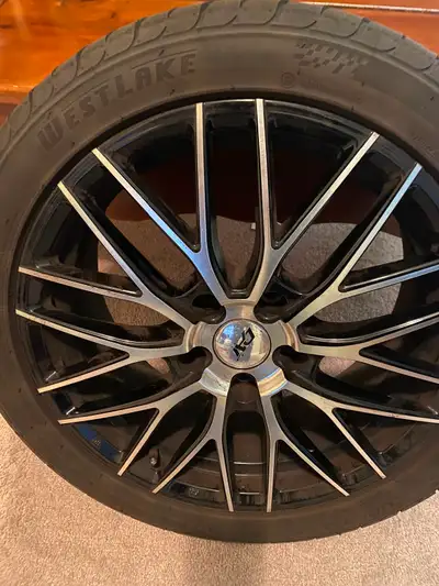 Four Mint condition rims.The tires should be good for another summer.They 225/45/17