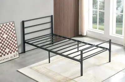 This is a twin size metal bed frame, perfect for a child's room or a guest room. It is in good condi...