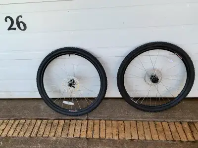 Brand new 29 er bike wheels and tires off a Raleigh bike . Quick release front and nut style rear ro...