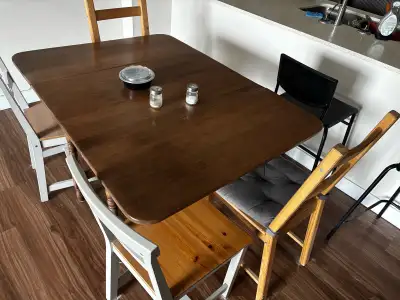 Dining table with four chairs. No scratches. $100 OBO. Contact through Kijiji please .