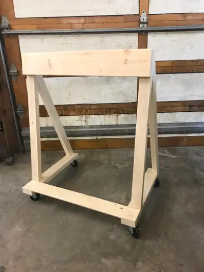 Outboard Motor Stand. Built very strong/sturdy. Model size (as pictured) 32" wide X 36" high.. Comes...