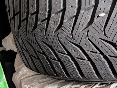 brand new 4x100 54.1 hub kumo wintercraft wp 52 new tires on brand new black steel rims 185 70 14 ....