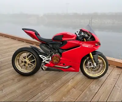 -Forged Marchesini gold aftermarket wheels -Techspec snake skin tank grip set -Rizoma spy R bar end...