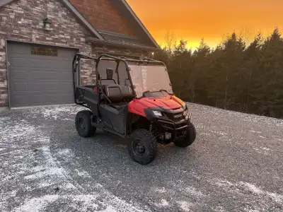 Honda pioneer for sale well maintained has upgraded shocks and tires 6000 kms