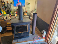 Woodburning stove and pipe