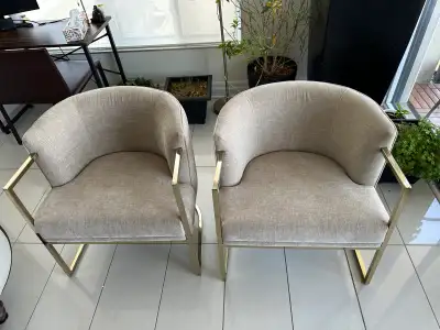 Or $250 each BRAND NEW & perfect condition Neutral tan with golden legs. Soft fabric and comfy seati...