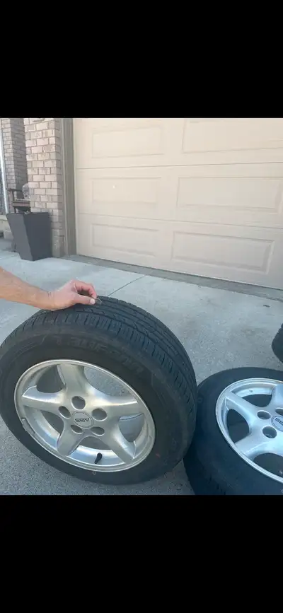 215/60R16 tires on rims Bolt pattern 5 x 120 Came off of ‘2002 Firebird but will fit other years. Ex...