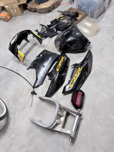 Various parts left over from a restoration project I completed of a 1996 CBR900RR Fireblade. Tank is...