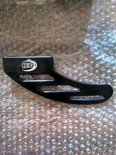 This R&G Toe Chain Guard - Road Racing Toe Guard, is brand new in box and will fit most sport bikes....