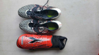Youth Underarmour soccer cleats and shin guards