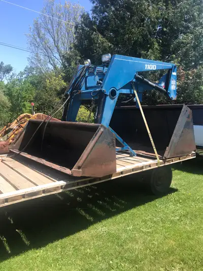 Please read add carefully! This front end loader was removed from a working Massey Ferguson 1100 ser...