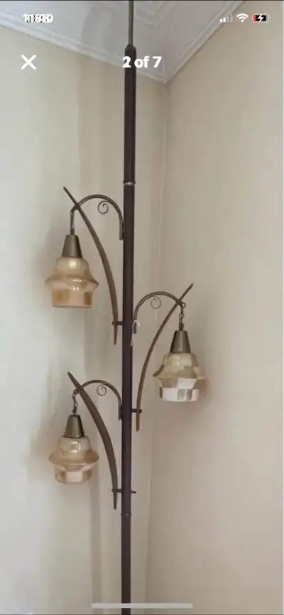 Rare MCM atomic Scandinavian floor to ceiling triple Beehive pole lamp with teak leaves. Must see it...
