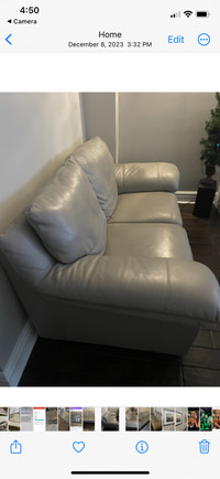2 grey all leather sofas 