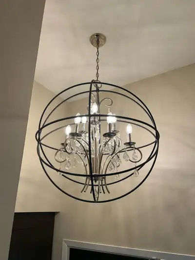 31” diameter hanging chandelier equipped with new led bulbs ready to install. We had it as a signatu...