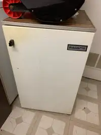 Polar brand small fridge with freezer portion old but work good