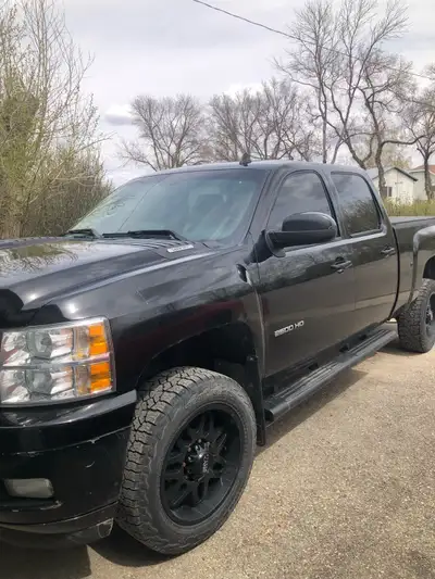 I'm selling my black Chevrolet Silverado 2500HD pickup truck, known for its robust performance and r...