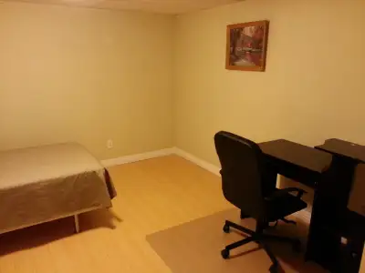A bright, fully furnished room in the basement apartment of a detached house in a calm residential n...