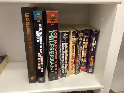 Embark on an epic space adventure with this collection of pre-loved science fiction novels by Lois M...