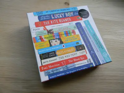 "Bibliophile" jigsaw puzzle. Designed by Jane Mount, and features book covers from many well-known a...