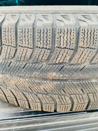 4 Michelin X-Ice Latitude winter tires on steel rims