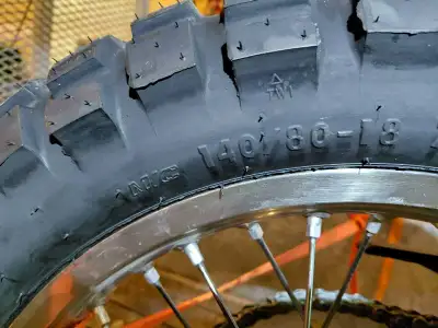 Brand new rear Continental dual sport tire. Removed from bike with 54 km. 140/80 18. Nibs still on t...