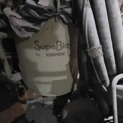 Empire Sandblasting pot with hoses automatic shut off. They sell new with hoses $13000,00 this pot w...