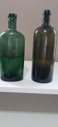 NICE DISPLAY  2 vintage green liquor bottles
