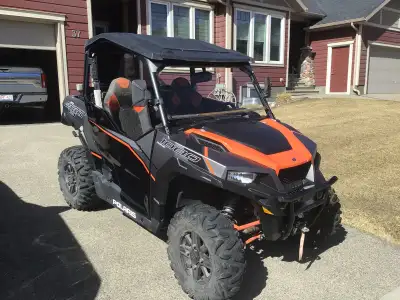 2018 General comes with 2 inch lift kit, Windshield, cargo dump box, winch, stereo system, spare tir...