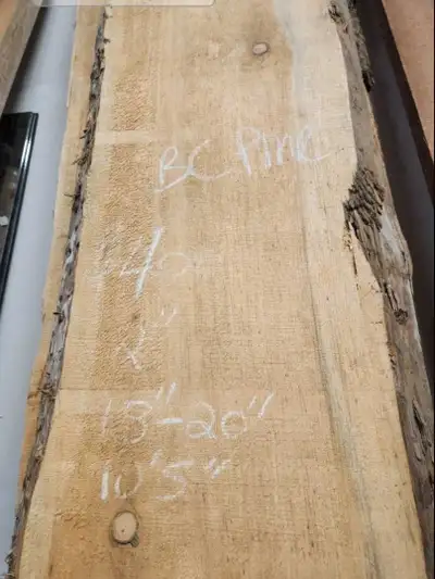 British Columbia pine slab 10'5" tall, 18"-20" wide and 2" deep Perfect for shelves or smaller table...
