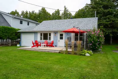 Cottage charm with year-round comfort, welcome to 210 Laird Lane - your modern, 4-season home or sum...