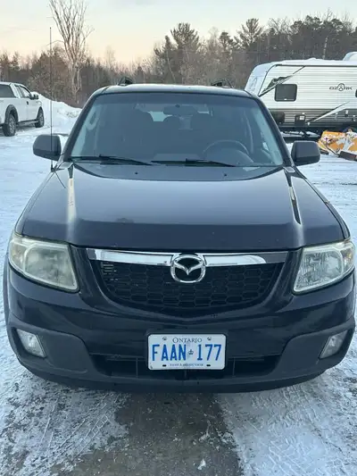 -Mazda tribute 2009 -195 000 km -Comes with a a set of mazda mags for summer tires AS IS wont be fil...