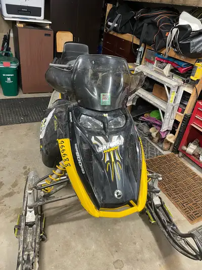 Studded track with no pull throughs or lugs missing ~18,500 km, was rebuilt around 12km (no paper wo...