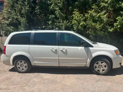 2009 Dodge Caravan that has been our trusted family vehicle for the past 16 years. It's in good runn...