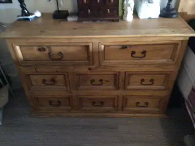 Solid pine 8 drawers. 34 inches high x 19 inches deep x 53 inches long. Great piece for bedroom/dini...