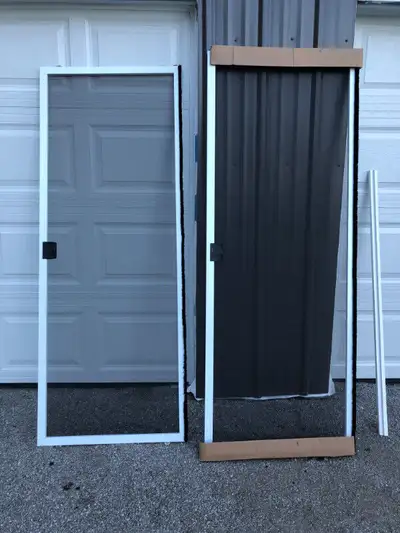 NOT SELLING DOORS JUST SCREENS! Selling new sets of double screen doors for 5 ft. garden doors. Pric...