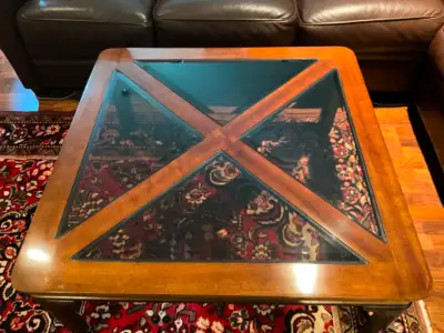 We are selling a pair of matching coffee tables. They were made by Gordon Fine Furniture in the US....