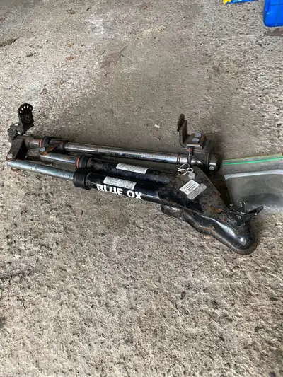Blue ox tow bar. Used to pull 2000 cavalier. Approx 20 years old. Included bolting pins.
