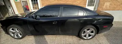 2011 Dodge Charger Interceptor. No accidents clean VIV Needs work on front suspension. Driver back d...