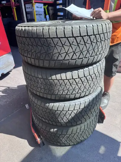 Winter tires with rims, Bridgestone-Blizzak, size 235/55R/18 used for two seasons only, great condit...