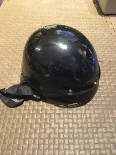 This is a CKX helmet in good condition, ready to protect your head. It has a shiny black finish. If...