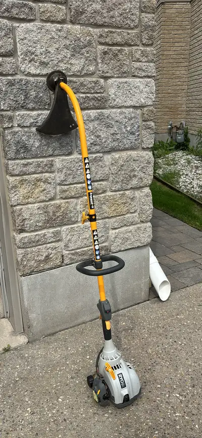 Gas Ryobi grass trimmer.