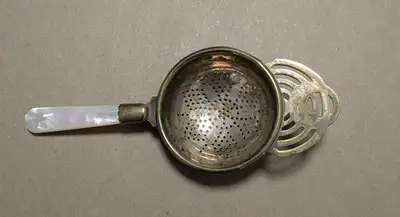 Vintage mother-of-pearl tea strainer, View more