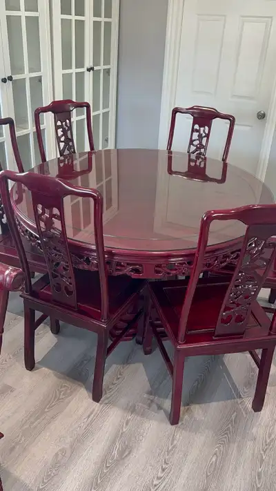 Elevate your dining space with this exquisite rosewood, View more