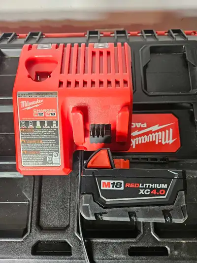 Milwaukee M18 4.0XC battery with Charger like new, View more