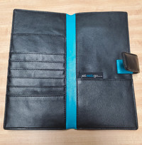 Brand new. Black & turquoise travel wallet by Jetsetgo