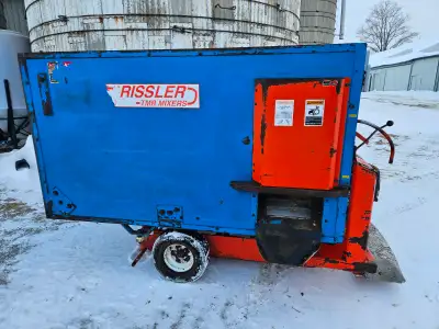 Rissler 740 TMR cart (2012 bought new). Selling as we purchased a larger cart. Recently replaced unl...
