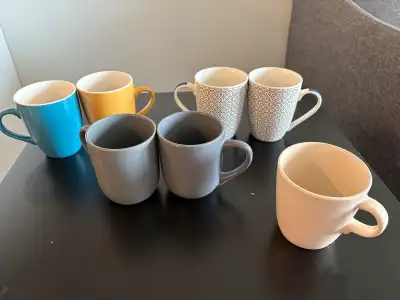 This set of eight assorted mugs includes pieces from IKEA and Casa Signature, offering a variety of...
