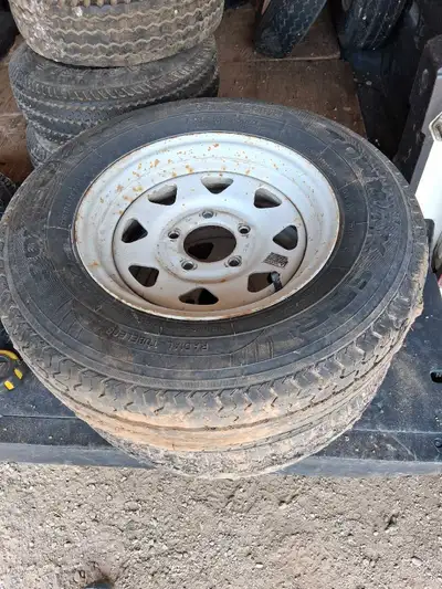 2 of ST 175/80R13 6 Ply rating 615kg at 50 PSI rims have 5 bolt holes on 4.5" centre to centre radiu...