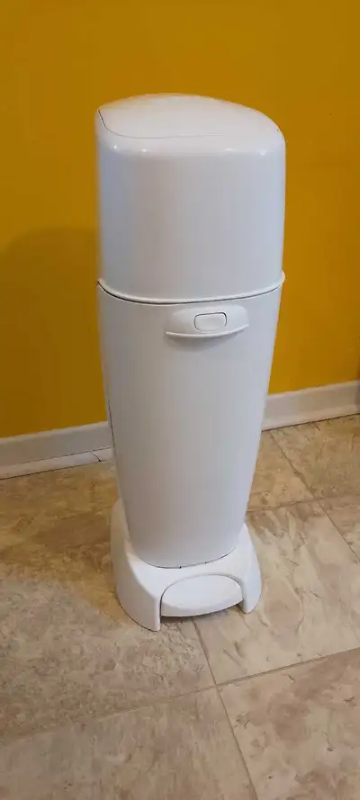 Gently used, cleaned. White diaper Genie.