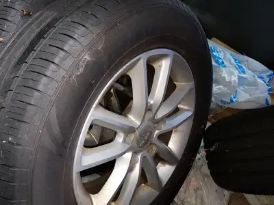 One set of tires are on Dodge Caravan alloy rims. Tires are Salun radials. Tires have low mileage. A...